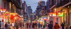 Pubs are alight with neon lights on New Oreleans famed Bourbon Street