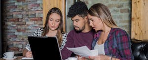 Young group of people researching student loans
