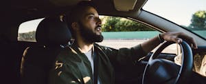 Man driving his car