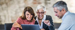 Mother and daughter looking at loan terms together