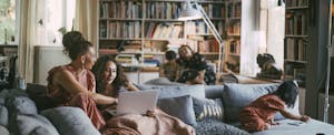 Family sitting together in their living room